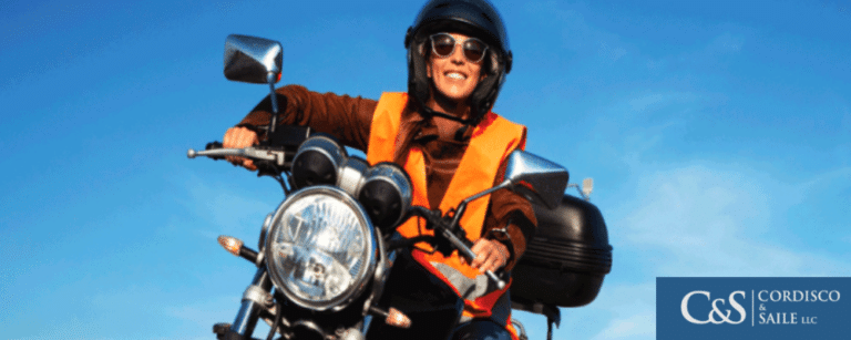 A man riding a motorcycle on the highway