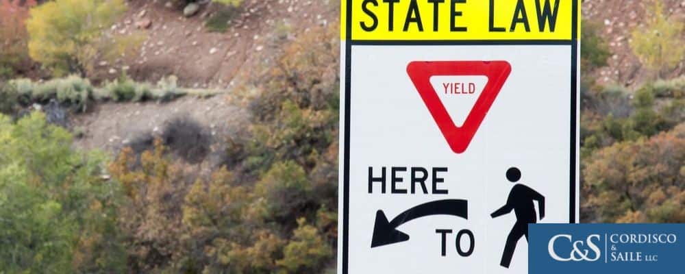 state law sign for yielding to pedestrians