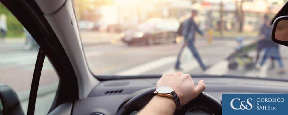 Driver about to hit pedestrians