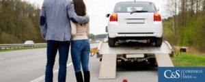 people watching as vehicle is towed away - how long does it take to settle a truck accident claim