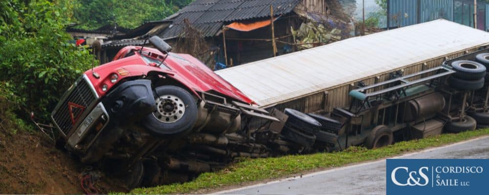 truck overturned on the side of the road after a truck accident